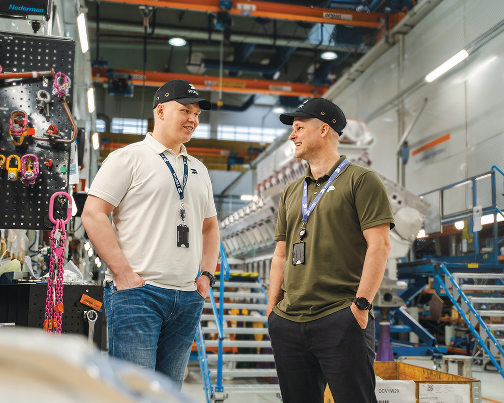 Prohoc's busniess development manager and Jani Laiho, Head of Production Services standing at a production hall